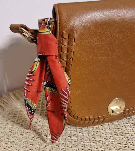 Bijou de sac Toucan rouge